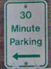 30 Minute Parking with a left arrow