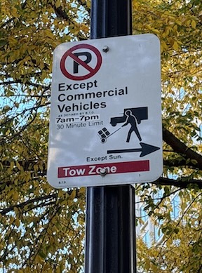 Commercial Vehicle Parking, limit 30 minutes, 7 AM to 7 PM, except Sunday